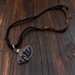 hand-embroidered eye pendant necklace