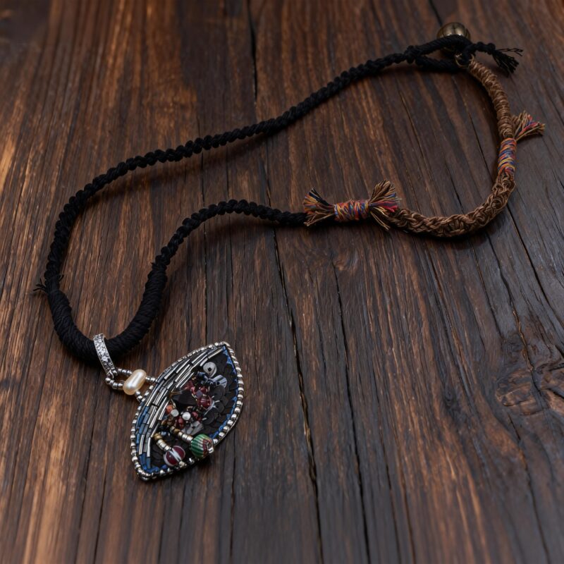 hand-embroidered eye pendant necklace