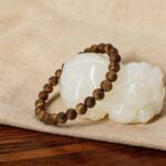 Hainan Green Qinan agarwood bracelet worn on wrist for daily minimal styling