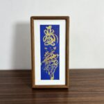 blue paper gold ink talisman